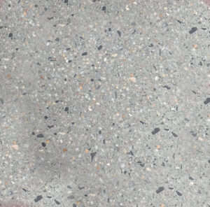Pebble gris con piedras negras